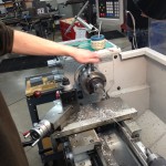 Daniel Heywood working on a steering extension part.