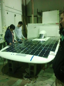 Careful alignment of the solar array is required, since the indentations on the carbon fiber shell allow for little tolerance
